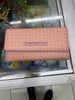 Cartera Tommy Hilfiger Estampada Rosada