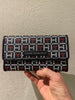 Cartera Tommy Hilfiger Estampado Azul, Roja, y Blanca