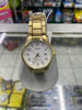 Reloj Casio dorado con caratula blanca