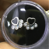 Aretes plata huellas
