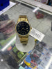 Reloj Casio dorado con caratula negra