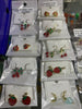 Aretes acero cerezas fresas y más