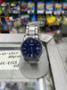 Reloj Casio plateado con caratula azul y fecha