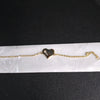 Pulsera acero corazón dorado