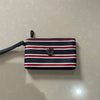 Cosmetiquera Tommy Hilfiger con rayas