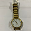 Reloj Q&Q dorado fondo blanco