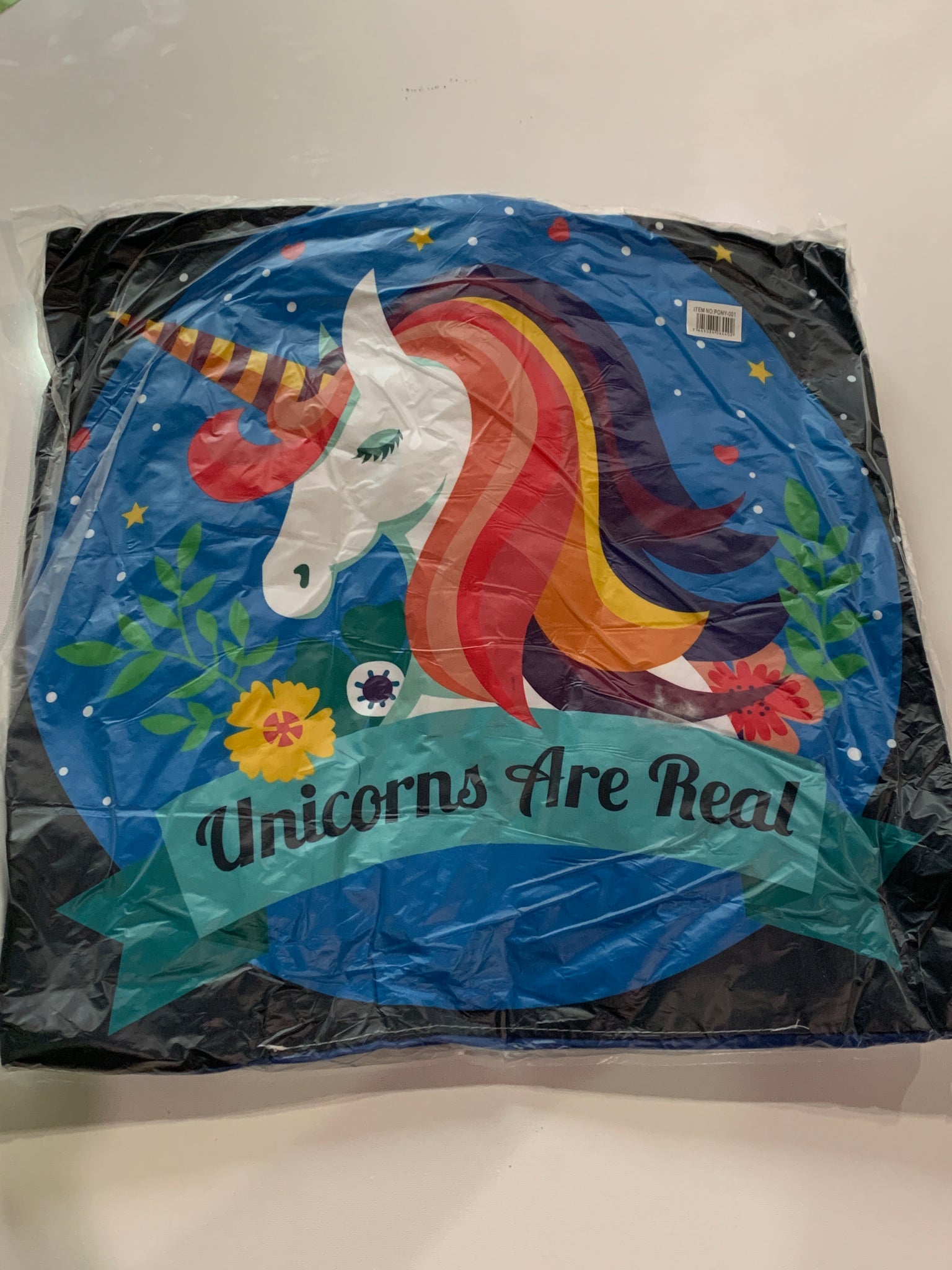 Cojín “unicorns are real”